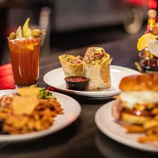 three plates of food and drinks