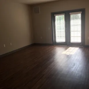 Living area from front door looking towards balcony doors