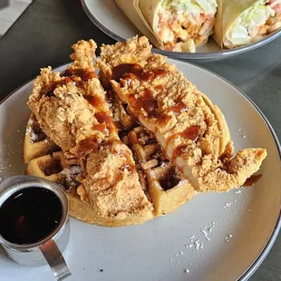 CHICKEN AND WAFFLES.... SWEET CREAM WAFFLE TOPPED WITH FRIED CHICKEN, ACHA HONEY BUTTER &amp; TOASTED PECANS.