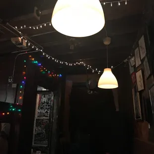 a couple of lights hanging from the ceiling