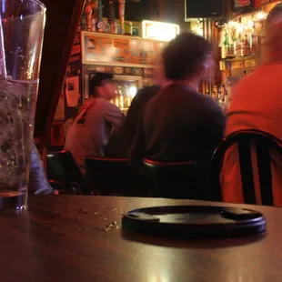 people sitting at the bar