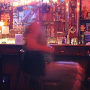 a man sitting at the bar