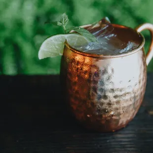 We feature many versions of a mule (our favorite is the Kentucky Mule made with bourbon of course! )