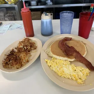Pancake, eggs, bacon and hash brown well!