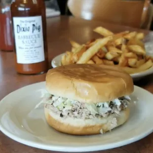 Pig sandwich, house made fries, world famous Dixie Pig sauce.