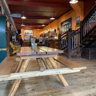 a wooden table and benches