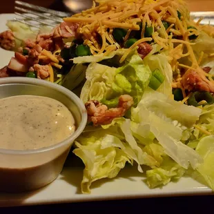 Side salad with peppercorn ranch dressing. Was good except it came with peas (yycchh) they probably would have not added them, had I noticed