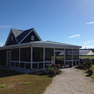 The tasting porch (outside tables are available when drinking wine by the glass or eating oysters).