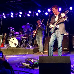 Up South Band and friends Colleen and Ron having a stage-light moment. Dog House.