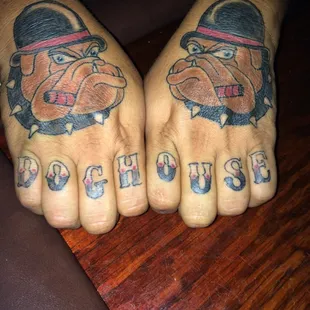 a pair of foot tattoos