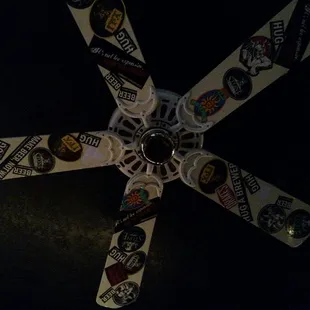 a fan with hockey stickers on it