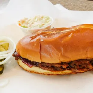 This is out Homemade Pulled Pork Sandwich with a side of Slaw!