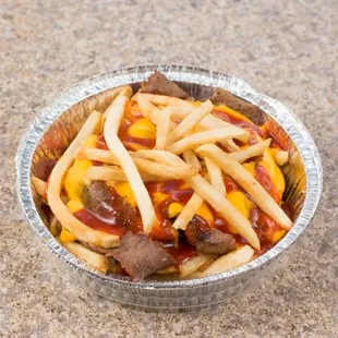 a bowl of fries and ketchup