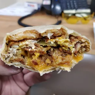 Love Actually burrito after a few bites. Everything level inside the burrito...DELICIOUS.