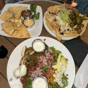 Cobb salad, chicken quesadilla and nachos