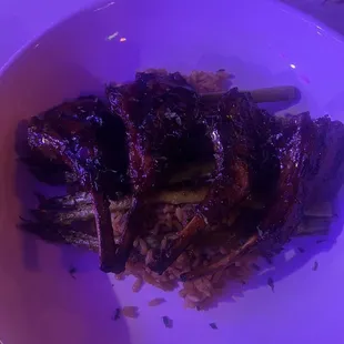 Lamb Chops with asparagus and dirty rice.