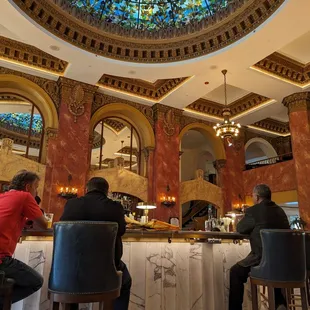 people sitting at the bar