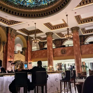 people sitting at the bar