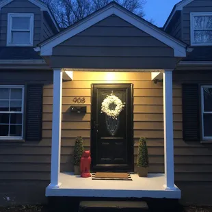 Concrete red owl for the new porch