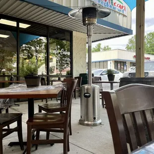 Restaurant sign and outside dining