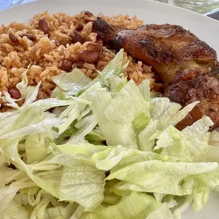 Rice and red beans, chicken and salad... I also had tostones