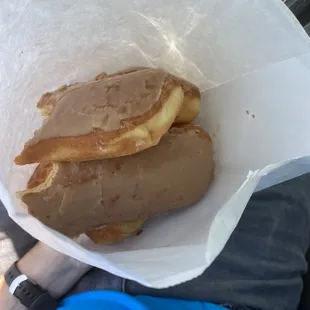 two donuts in a paper bag