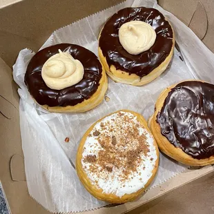 Buckeye, Custard filled and Apple Cream Cheese. Oh... and a couple of loose pecans from the Pecan donuts I inhaled.