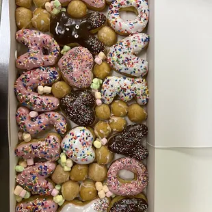 a variety of donuts in a box