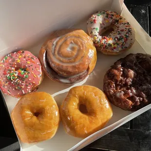 a variety of donuts in a box