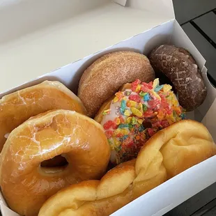 a variety of donuts in a box