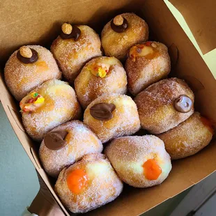 Malasadas: (from back to front) PB Chocolate, fruity pebbles, Nutella, POG