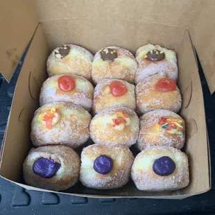 Malasadas: Chocolate peanut butter | Guava | Fruity Pebbles | Ube