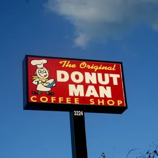 a donut man sign
