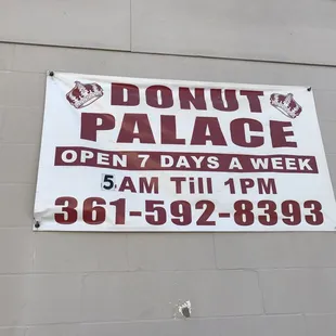 a donut palace sign