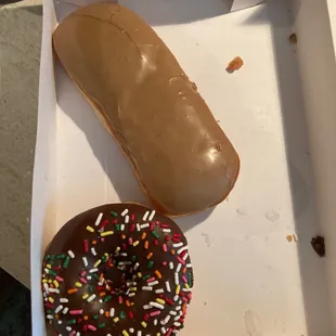 Maple Long John and a plain cake donut with chocolate frosting