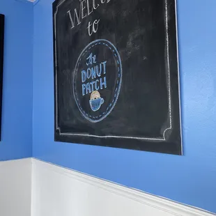 a blackboard with a donut on it