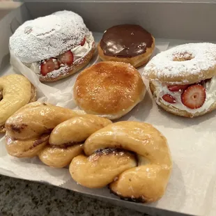 Croissant fresh strawberry, kreme filled donut, creme brûlée donut, strawberry heart attack, chocolate cinnamon twist, peanut butter donut