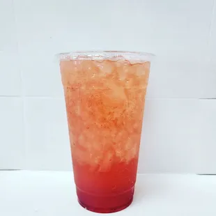 a drink in a plastic cup