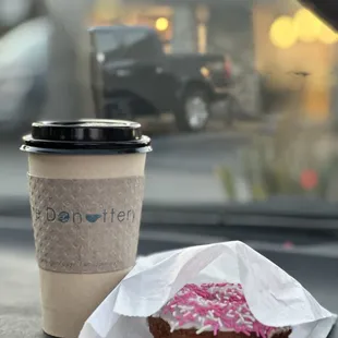 a donut and a cup of coffee