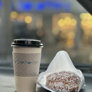 a cup of coffee and a donut