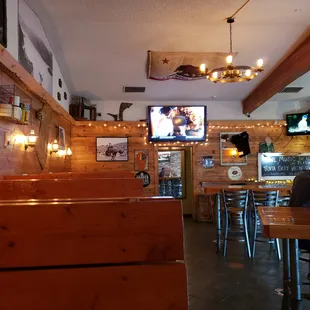 a man sitting at a table in a restaurant
