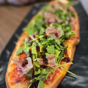 Prosciutto and arugula flatbread