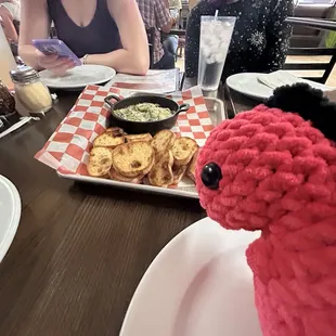 Microwave the dino with artichoke dip