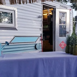 a table outside of a trailer