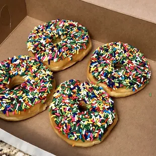 four donuts in a box