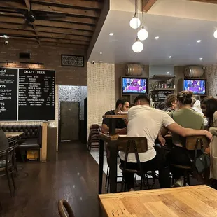 people sitting at the bar