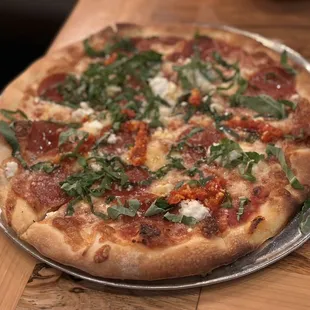 a pizza on a metal pan