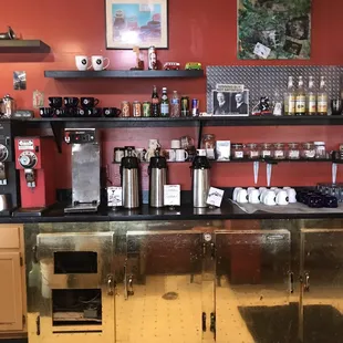a kitchen with stainless steel counter tops