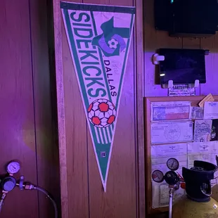 a green and white pennant