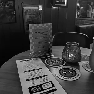 a table with drinks and menus